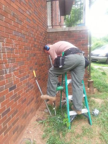 Jason is installing new ground rods in Conover, NC